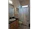 Clean bathroom with granite countertop and white fixtures at 2365 Ardenwood Dr, Spring Hill, FL 34609