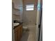 Bathroom features a tub, shower, and modern vanity at 2365 Ardenwood Dr, Spring Hill, FL 34609