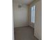 Bright bedroom with ceiling fan and neutral carpeting at 2365 Ardenwood Dr, Spring Hill, FL 34609