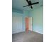 Bedroom with ceiling fan and light blue walls at 2365 Ardenwood Dr, Spring Hill, FL 34609