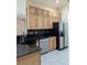 Modern kitchen with stainless steel appliances and ample cabinetry at 2365 Ardenwood Dr, Spring Hill, FL 34609