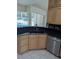 Kitchen with double sink and pool view at 2365 Ardenwood Dr, Spring Hill, FL 34609