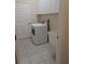 Laundry room with washer, dryer, and storage cabinets at 2365 Ardenwood Dr, Spring Hill, FL 34609