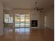 Spacious living room with fireplace and pool view at 2365 Ardenwood Dr, Spring Hill, FL 34609