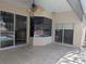 Spacious patio with pool access and sliding glass doors at 2365 Ardenwood Dr, Spring Hill, FL 34609