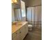 Bathroom with vanity, shower/tub combo and tile floors at 306 S Edison Ave # 1, Tampa, FL 33606