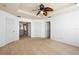 Main bedroom with ceiling fan and ample closet space at 3533 Juneberry Drive, Wesley Chapel, FL 33543