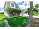 House exterior with artificial turf and landscaping at 3533 Juneberry Drive, Wesley Chapel, FL 33543