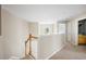 Upper level hallway with access to bedrooms and bath at 3533 Juneberry Drive, Wesley Chapel, FL 33543