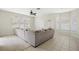 Spacious living room with large corner sofa and window views at 3533 Juneberry Drive, Wesley Chapel, FL 33543