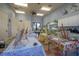 Creative art studio with tables, easels, and art supplies at 417 Brandywine Falls Ct, Apollo Beach, FL 33572