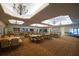 Large banquet hall with tables and chairs, perfect for events at 417 Brandywine Falls Ct, Apollo Beach, FL 33572