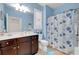 Guest bathroom with single vanity and shower/tub combo at 417 Brandywine Falls Ct, Apollo Beach, FL 33572