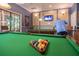 Relaxing billiards room with two pool tables and plenty of space at 417 Brandywine Falls Ct, Apollo Beach, FL 33572