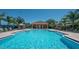 Rectangular pool with a gazebo and plenty of lounge chairs at 417 Brandywine Falls Ct, Apollo Beach, FL 33572