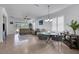 Spacious living room with tile floors, light walls, and comfy seating at 417 Brandywine Falls Ct, Apollo Beach, FL 33572