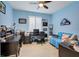Home office featuring a desk, comfortable seating, and ample storage at 417 Brandywine Falls Ct, Apollo Beach, FL 33572