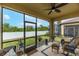 Relaxing screened porch overlooking backyard at 417 Brandywine Falls Ct, Apollo Beach, FL 33572
