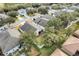 Aerial view of house, backyard, and neighborhood, highlighting the property's location and surroundings at 4605 Lisette Cir, Brooksville, FL 34604