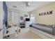 bedroom with twin bed, desk space, and a playful space theme at 4605 Lisette Cir, Brooksville, FL 34604