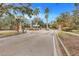 Gated community entrance with guardhouse at 4605 Lisette Cir, Brooksville, FL 34604