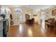 Dining area with hardwood floors and access to the kitchen and entryway at 4605 Lisette Cir, Brooksville, FL 34604
