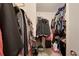 Large walk-in closet with ample hanging space and shelving at 4605 Lisette Cir, Brooksville, FL 34604