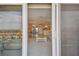 View from balcony showcases water, building, and partial city views at 4900 Brittany S Dr # 701, St Petersburg, FL 33715
