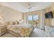 Main bedroom with water views and a king bed at 4900 Brittany S Dr # 701, St Petersburg, FL 33715
