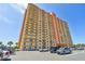 High-rise condo building with many balconies and parking at 4900 Brittany S Dr # 701, St Petersburg, FL 33715
