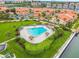 Community pool with lush landscaping and a tranquil atmosphere at 4900 Brittany S Dr # 701, St Petersburg, FL 33715