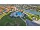 Community pool with surrounding patio and grilling area at 4900 Brittany S Dr # 701, St Petersburg, FL 33715