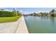 Pathway alongside canal offering peaceful waterfront views at 4900 Brittany S Dr # 701, St Petersburg, FL 33715