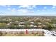 Aerial view of condo building showcasing its location and surrounding landscape at 4920 Locust Ne St # 116, St Petersburg, FL 33703