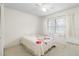 Bright bedroom with double bed and window coverings at 4920 Locust Ne St # 116, St Petersburg, FL 33703
