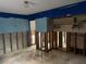 Unfinished basement with walls needing repair at 4933 Venetian Ne Blvd, St Petersburg, FL 33703
