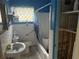 Bathroom with shower/tub combo and small closet at 4933 Venetian Ne Blvd, St Petersburg, FL 33703