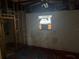 Bedroom with window and damaged walls needing repair at 4933 Venetian Ne Blvd, St Petersburg, FL 33703