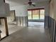 Spacious living room with large window and view of backyard at 4933 Venetian Ne Blvd, St Petersburg, FL 33703