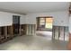 Large living room undergoing renovation at 4933 Venetian Ne Blvd, St Petersburg, FL 33703