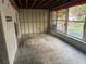 Sunroom with large windows overlooking the backyard at 4933 Venetian Ne Blvd, St Petersburg, FL 33703