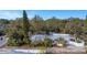 Aerial view of a house and surrounding trees at 5309 21St S Ave, Gulfport, FL 33707