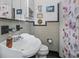 Clean bathroom with a pedestal sink and shower/tub combo at 5309 21St S Ave, Gulfport, FL 33707