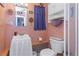Small bathroom with toilet and sink at 5309 21St S Ave, Gulfport, FL 33707
