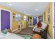 Bright bonus room with futon and cat tree at 5309 21St S Ave, Gulfport, FL 33707