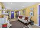 Spacious bonus room with futon and cat tree at 5309 21St S Ave, Gulfport, FL 33707