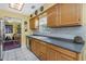 Kitchen with stainless steel appliances and wood cabinets at 5309 21St S Ave, Gulfport, FL 33707