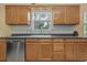 Kitchen with stainless steel appliances and wood cabinets at 5309 21St S Ave, Gulfport, FL 33707