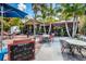 Inviting patio seating area at a restaurant with tables and umbrellas at 5309 21St S Ave, Gulfport, FL 33707