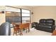 Home office with built-in desk and large window at 5581 Salem Square S Dr, Palm Harbor, FL 34685